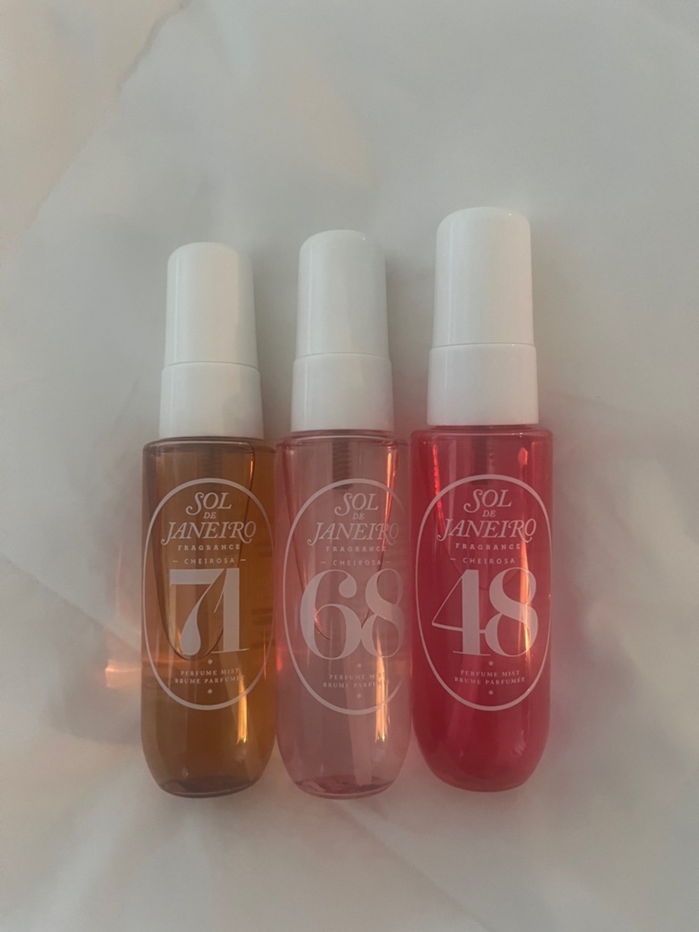 Sol de Janeiro Mini Perfume Mist Trio — Amber, Pink, Red Bottles